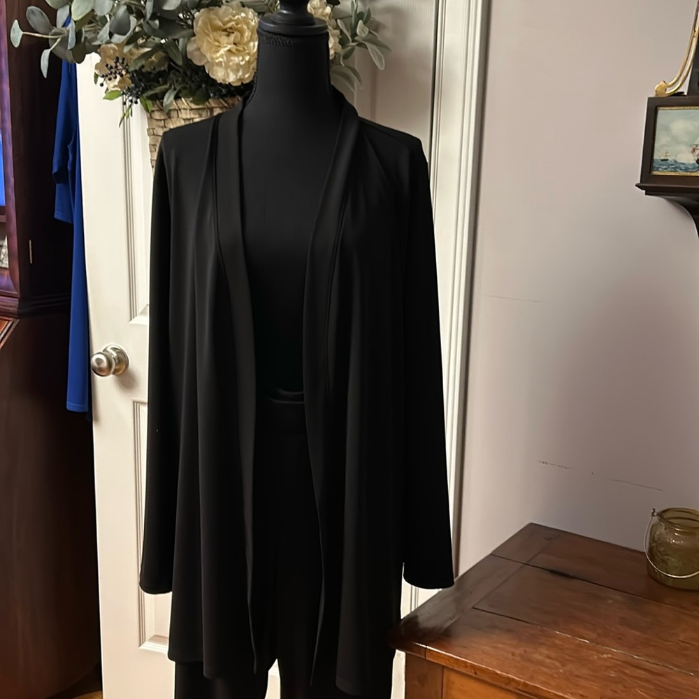 Talbots pants size 1X. Jacket size 2X  like new. Suit black in color